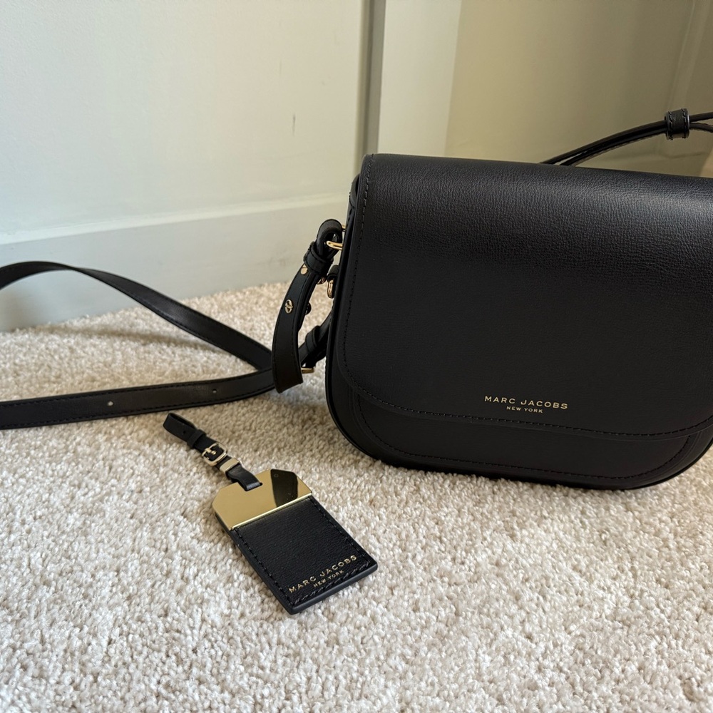 Marc Jacobs black crossbody bag. Only worn once. 
Perfect condition.
